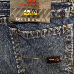 Men’s Ariat Low Rise M4 FR work jeans. New with tags. Medium blue 36/34